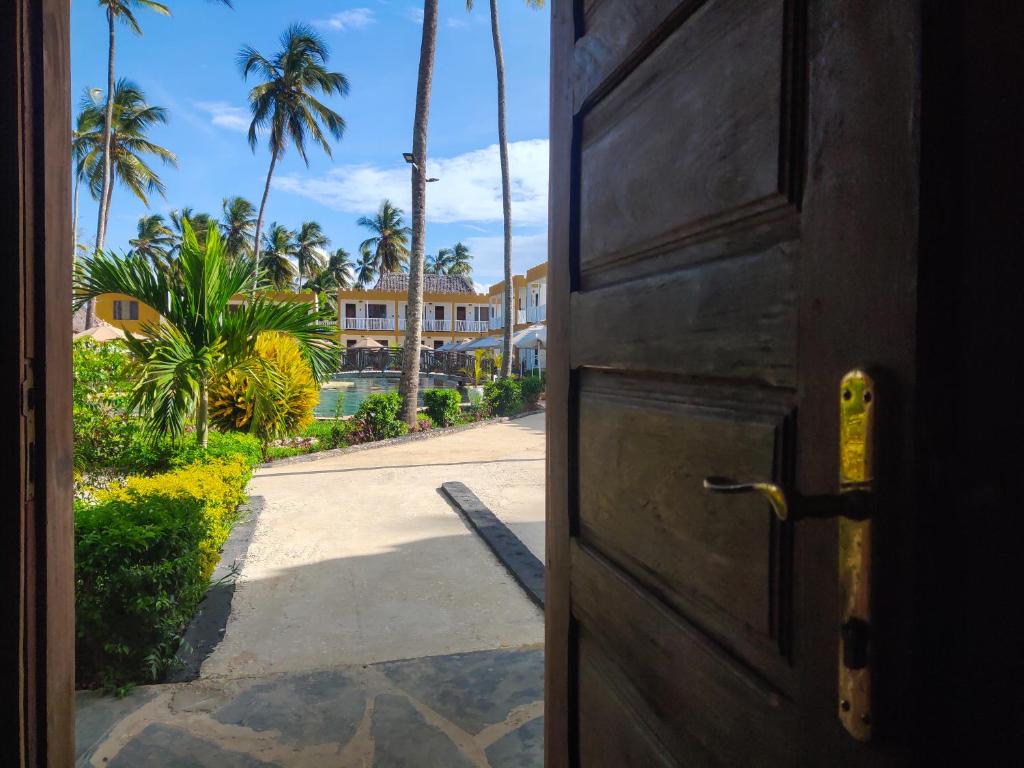 View through a hand-carved Zanzibari door